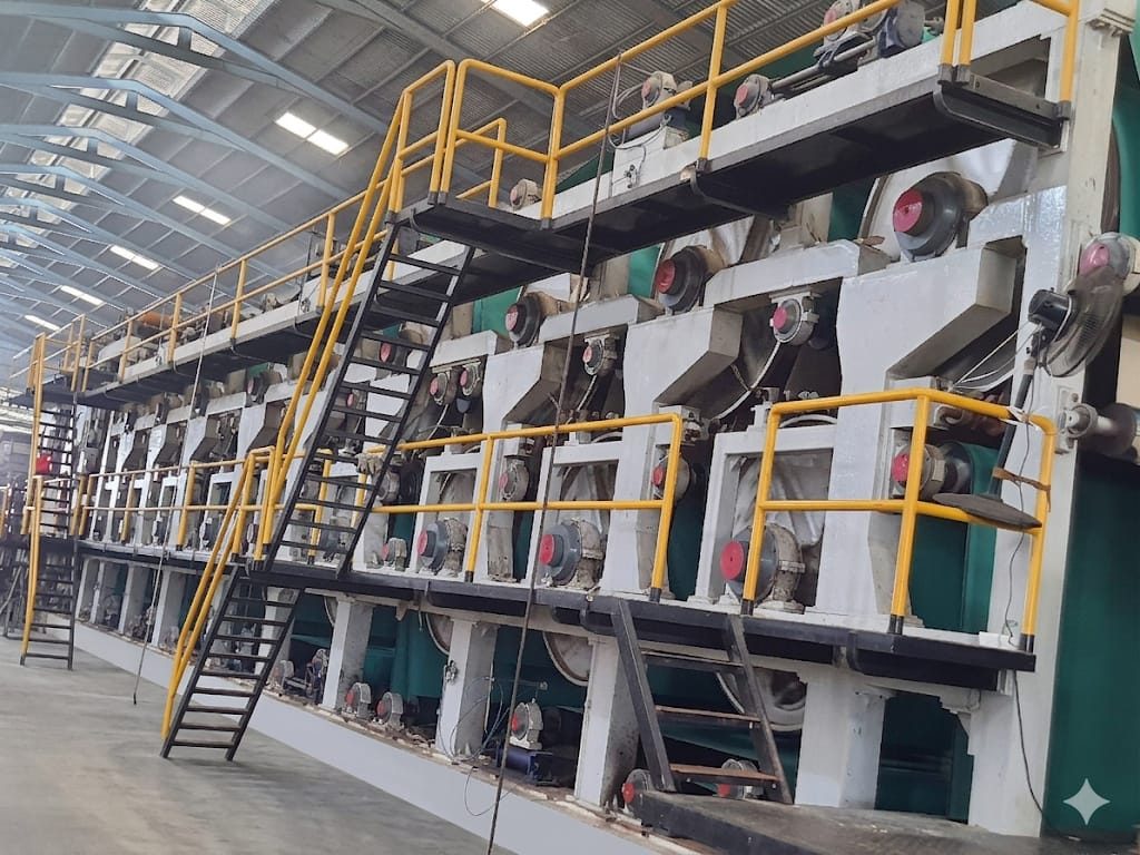Paper machine in operation at a Rajshree paper mill